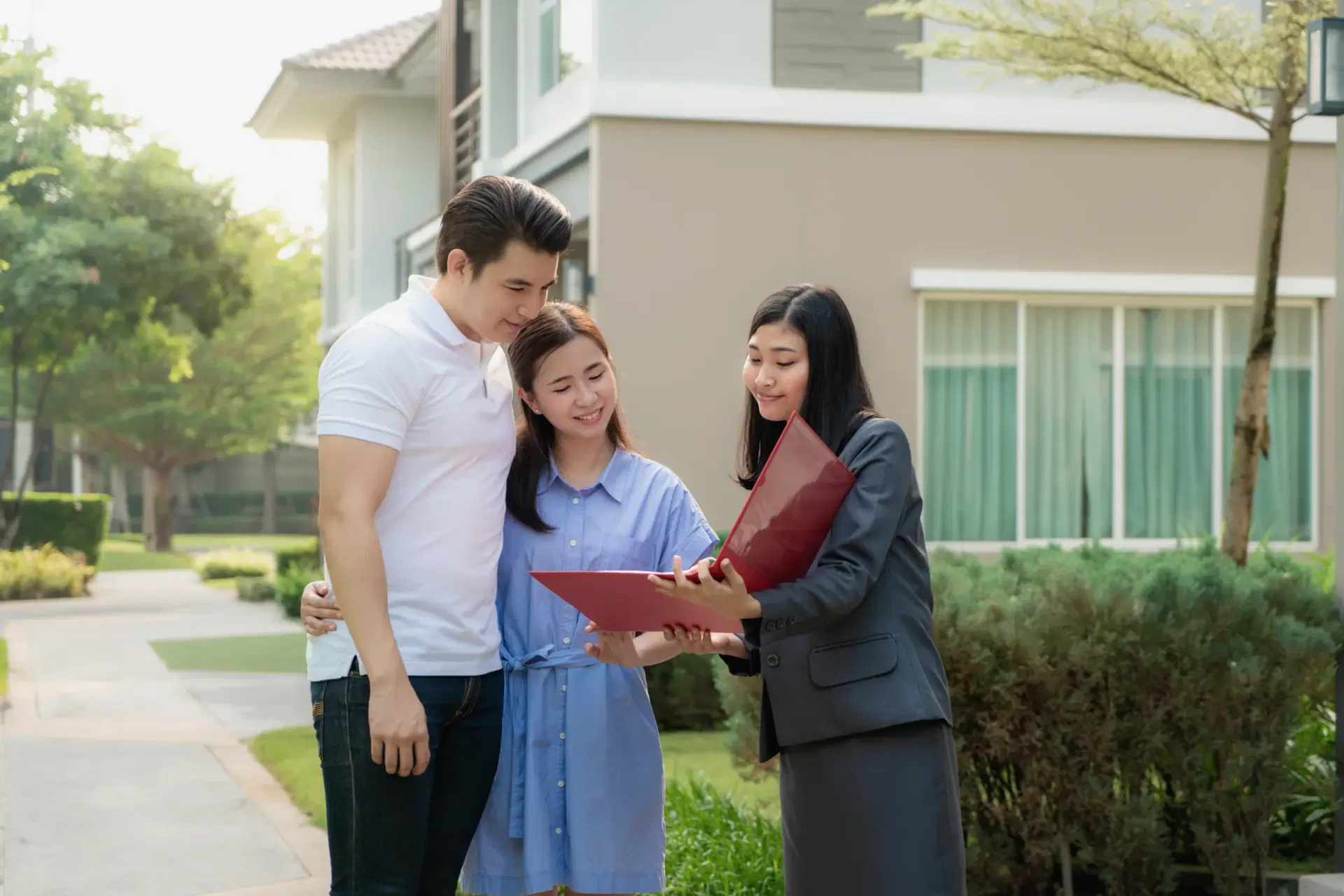 asian-woman-real-estate-broker-agent-showing-house-detail-her-file-young-asian-couple-lover-looking-interest-buy-it